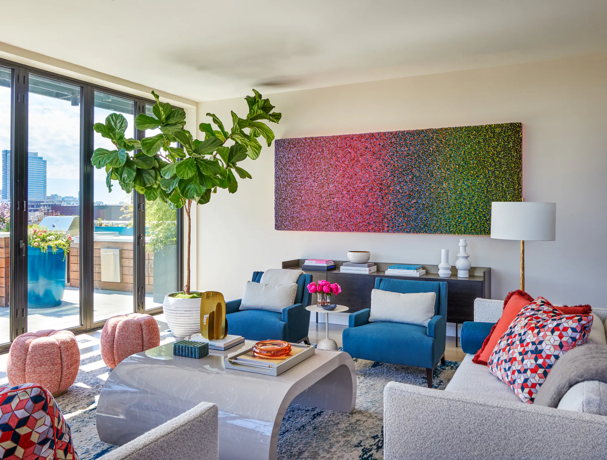 Luxury Penthouse Opens to a Terrace with Accordion Glass Walls
